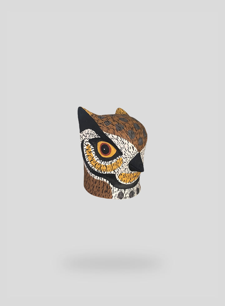 The Mini Horned Owl