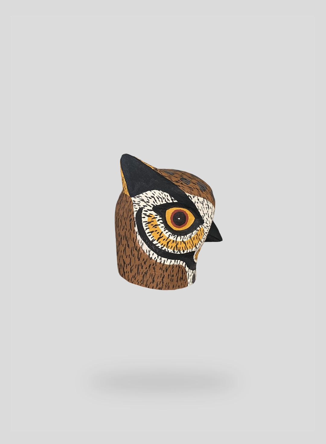 The Mini Horned Owl